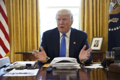 Trump en el Despacho Oval.-JONATHAN ERNST / REUTERS