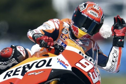 Marc Márquez ha logrado en Australia su octava 'pole' de la temporada.-AFP / SAEED KHAN