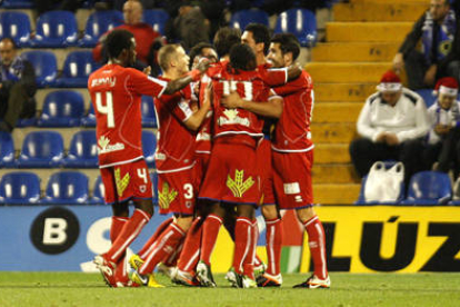 Los jugadores del Numancia celebran uno de los goles anotados ante el Hércules. / ÁREA 11-