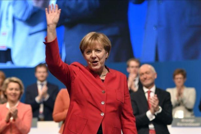 Angela Merkel, en el congreso de la CDU.-AP / MARTIN MEISSNER