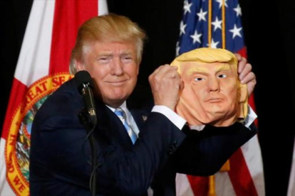 Donald Trump en plena campaña electoral.-REUTERS / CARLO ALLEGRI