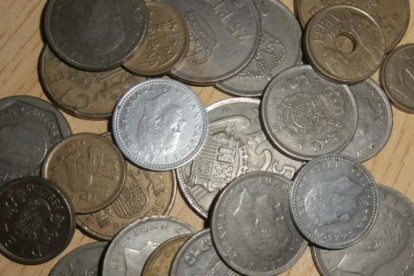 Varias pesetas, la antigua moneda española.-EL PERIÓDICO