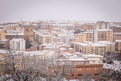 Estampas de capital y provincia con un manto blanco