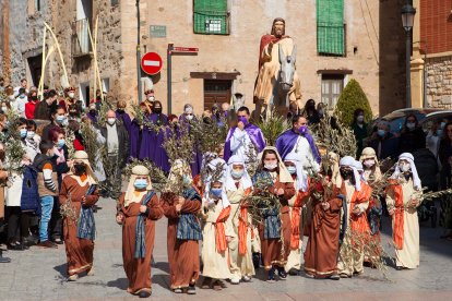 Niños y cofrades participan en la procesión del Domingo de Ramos en Ágreda, una de las tradiciones más arraigadas
