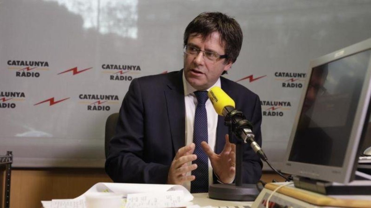 El 'president' Carles Puigdemont, este jueves, durante la entrevista en Cataluña Ràdio.-FERRAN NADEU