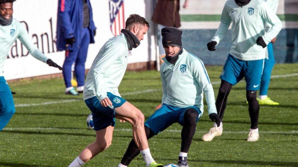 Griezmann y Saúl, en un entrenamiento del Atlético-EFE
