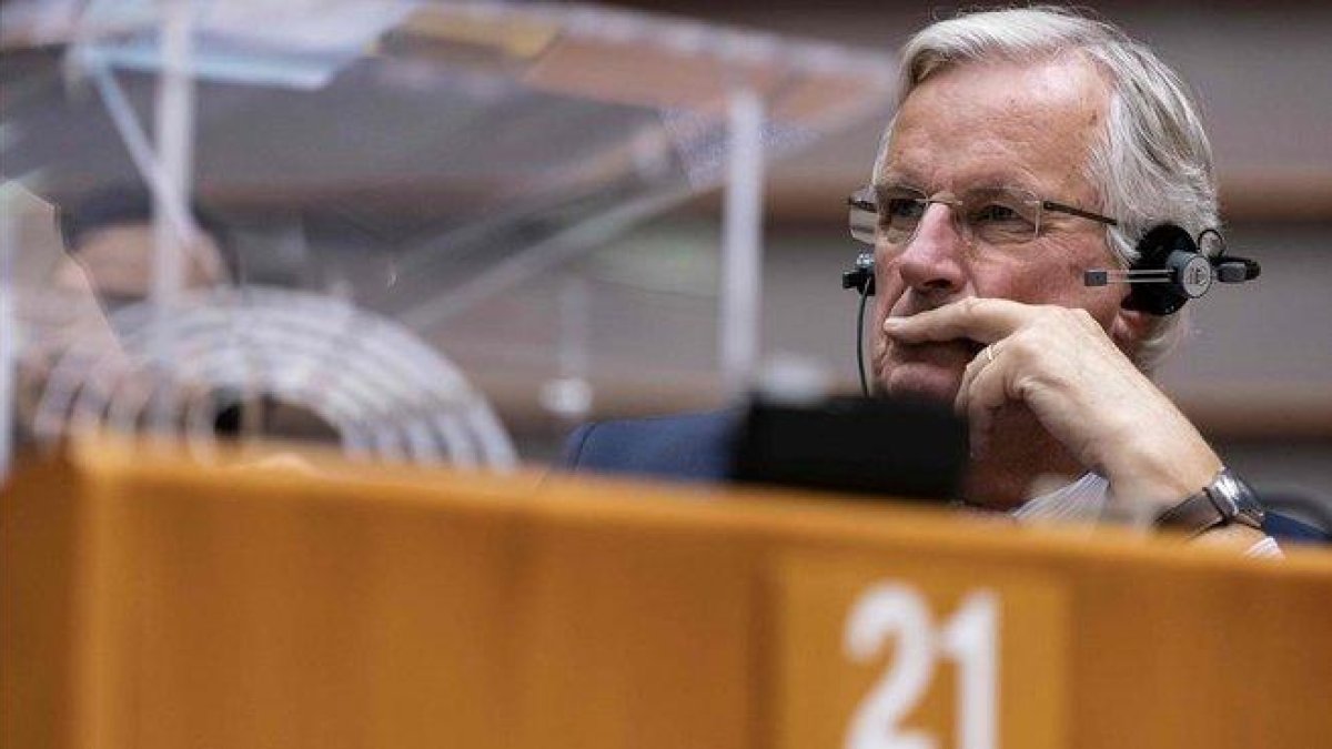 El negociador jefe de la UE, Michel Barnier, durante el pleno de este miércoles de la Eurocámara.-KENZO TRRIBOUILLARD (AFP)