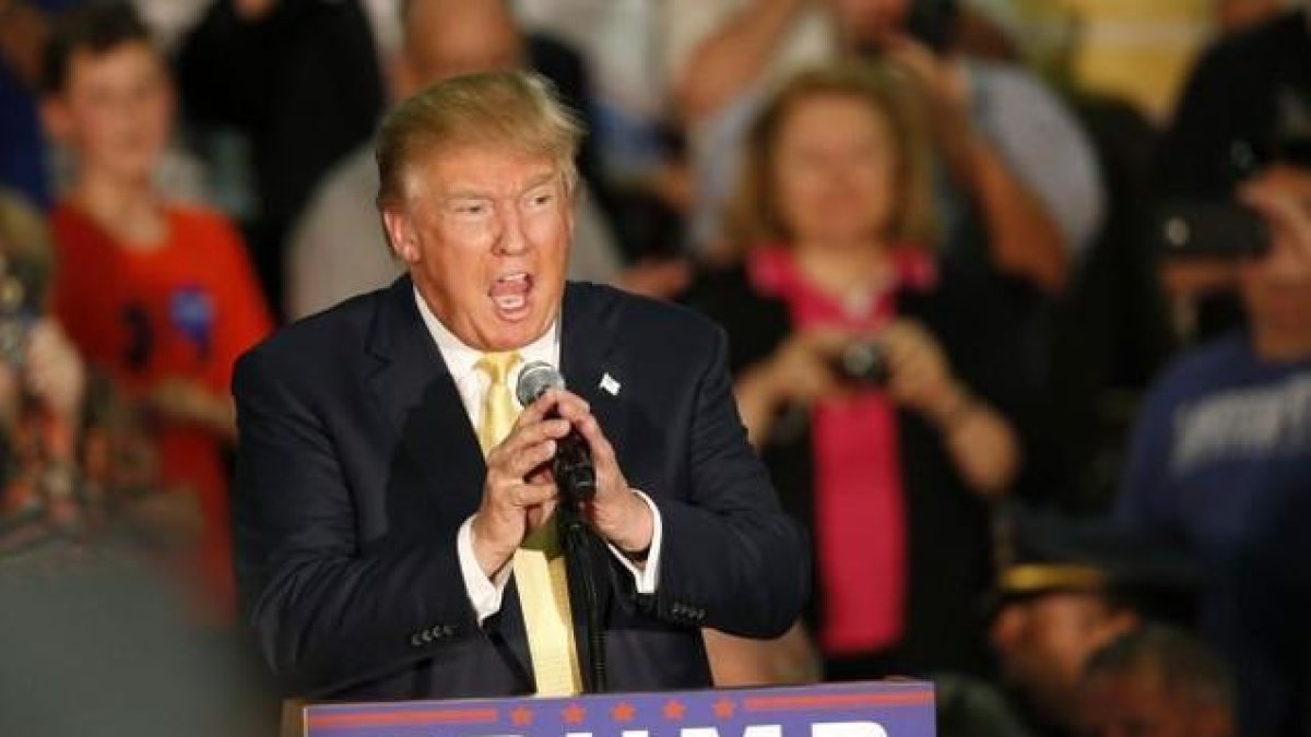 Donald Trump hablando durante el mitin electoral que tuvo ligar el jueves en Rochester.-AP / ROBERT F. BUKATY