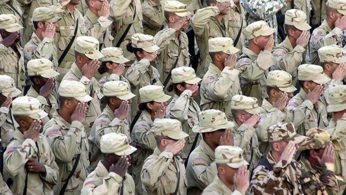 Soldados americanos en Afganistán durante la conmemoración del atentado del 11-S.-DESHA KAYLAN (AFP)