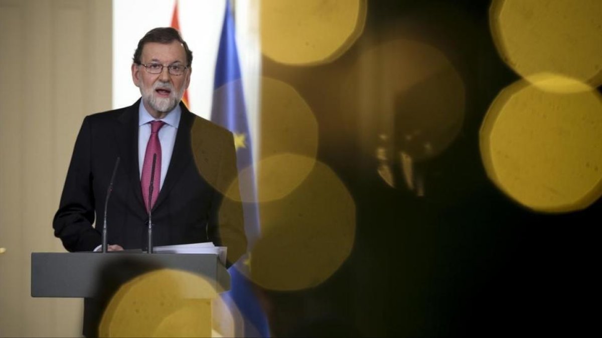 El presidente del Gobierno, Mariano Rajoy, durante su comparecencia de fin de año en el Palacio de la Moncloa.-/ JUAN MANUEL PRATS