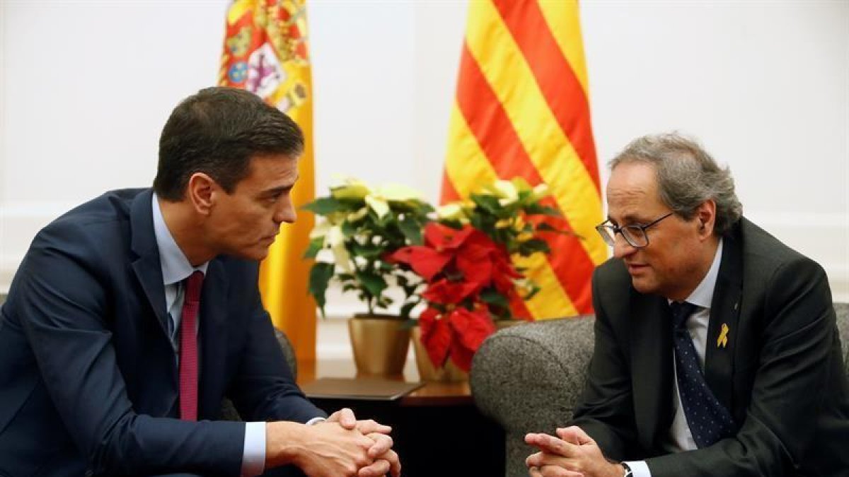 El presidente del Gobierno, Pedro Sánchez, y el presidente de la Generalitat, Quim Torra.-EFE