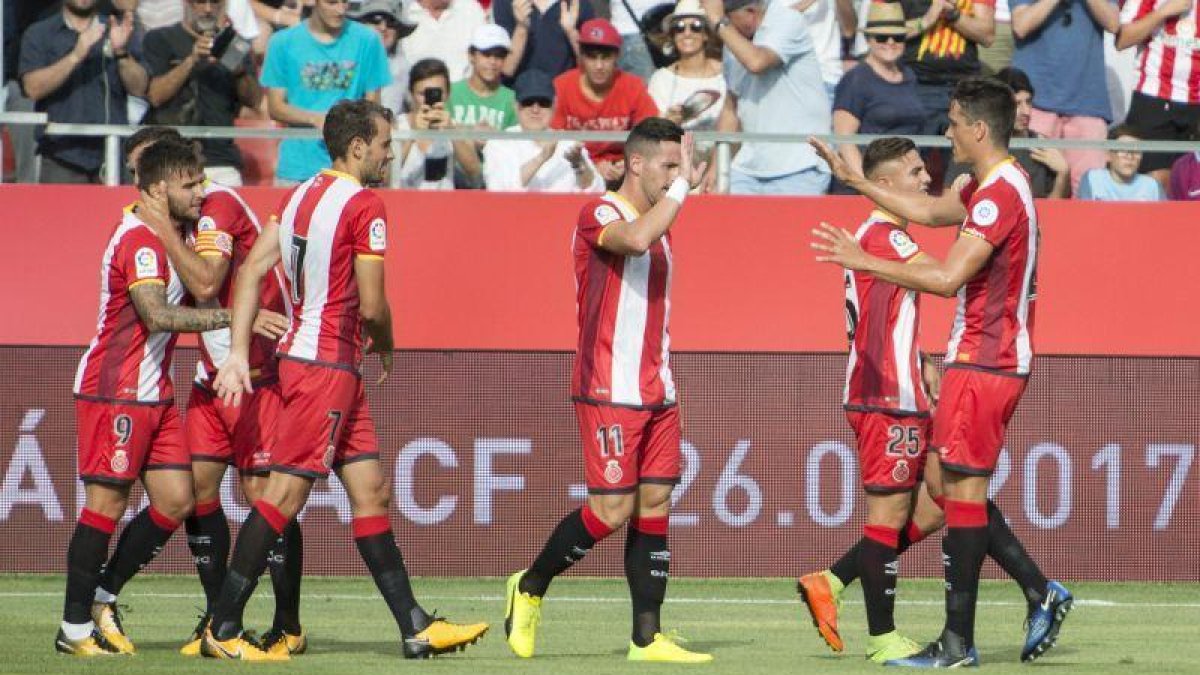 Los jugadores del Girona celebran el gol ante el City.-GLÒRIA SÁNCHEZ / ICONNA