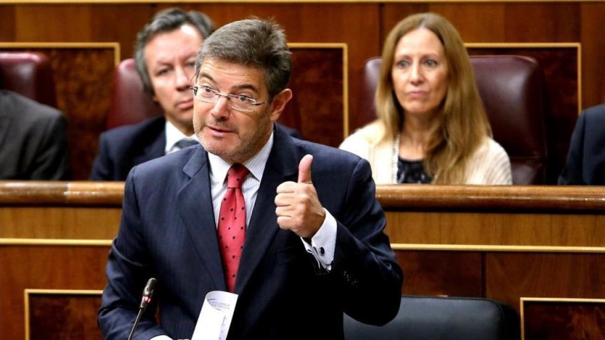 El ministro de Justicia, Rafael Catalá, en el pleno del Congreso.-/ JUAN MANUEL PRATS
