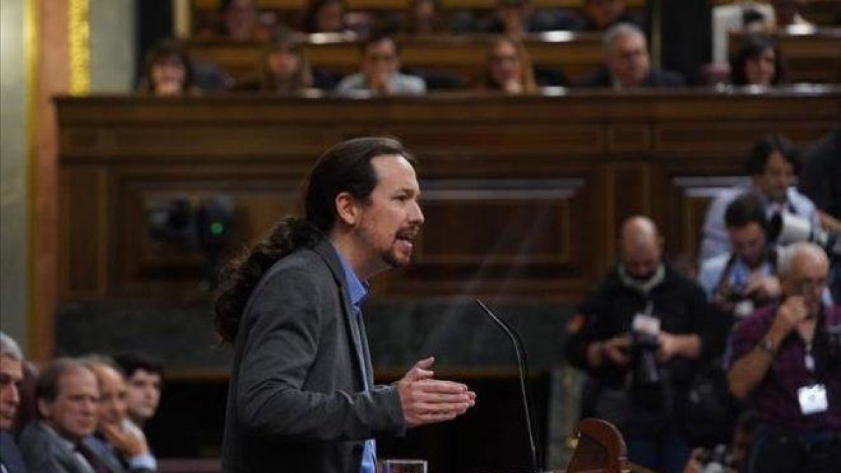 El secretario general de Unidas Podemos, Pablo Iglesias, durante el debate de investidura de Pedro Sánchez.-DAVID CASTRO