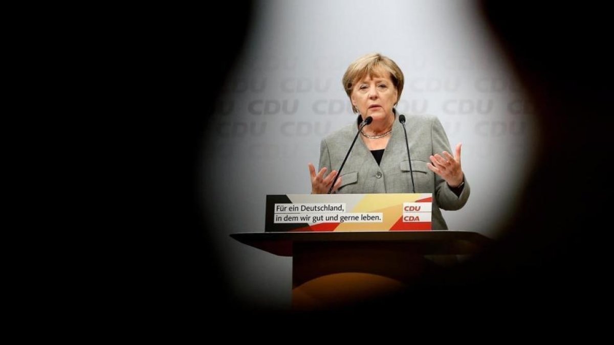 Merkel interviene en el mitin de Dortmund, el 12 de agosto.-EFE / FRIEDEMANN VOGEL