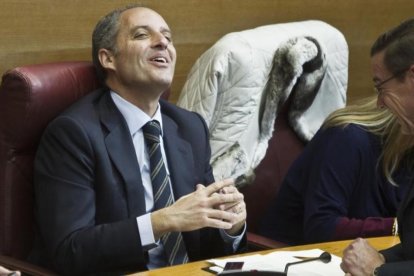 El expresidente de valenciano Francisco Camps, en su escaño de las Corts, en el 2012.-MIGUEL LORENZO