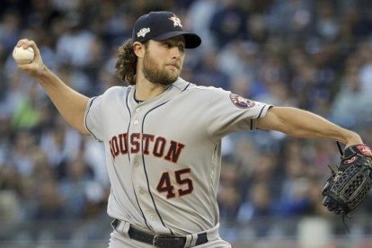 El lanzador Gerrit Cole establece un nuevo récord al fichar por los Yankees de NY. El lanzador Gerrit Cole establece un nuevo récord al fichar por los Yankees de NY.-AP