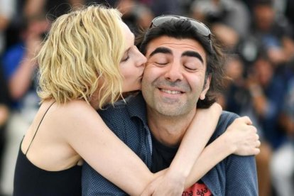 Diane Kruger y Fatih Akin, en la presentación de 'In the fade' en Cannes.-AFP / ALBERTO PIZZOLI