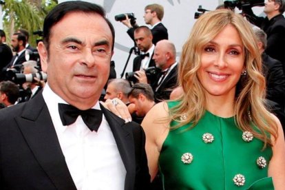 Carlos Ghosn y su esposa Carole en un acto.-X00211