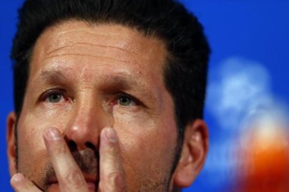 Simeone, en la sala de prensa del Allianz Arena de Múnich.-AP / MATTHIAS SCHARADER