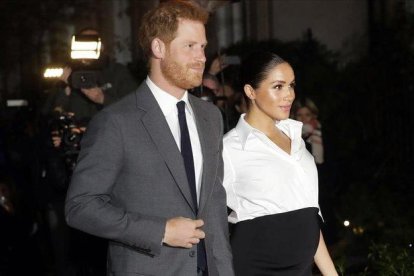 Enrique de Inglaterra y Meghan Markle, el pasado febrero.-AP / KIRSTY WIGGLESWORTH