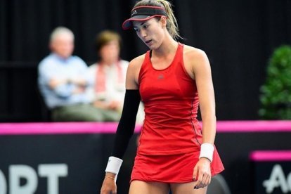 Muguruza, decepcionada tras caer en el primer partido ante Bélgica.-