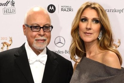 René Angelil y Céline Dion, en noviembre del 2012.-AFP / JOHN MACDOUGALL