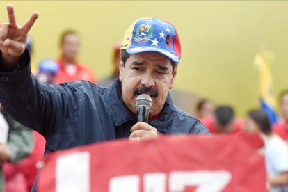 Maduro en la fiesta del Primero de Mayo en Caracas.-AFP / JUAN BARRETO