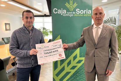 Alberto Martín, de Cáritas, e Ismael Ruiz, de Caja Rural de Soria.-HDS