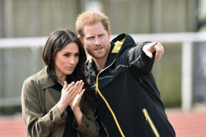 Meghan Markle y el príncipe Enrique.-EFE / NEIL MUNNS