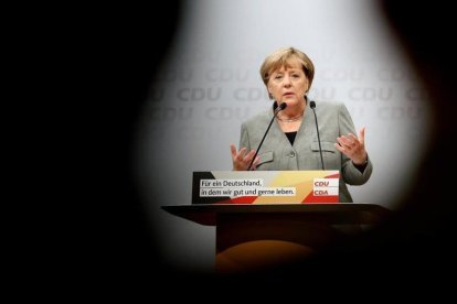 Merkel interviene en el mitin de Dortmund, el 12 de agosto.-EFE / FRIEDEMANN VOGEL