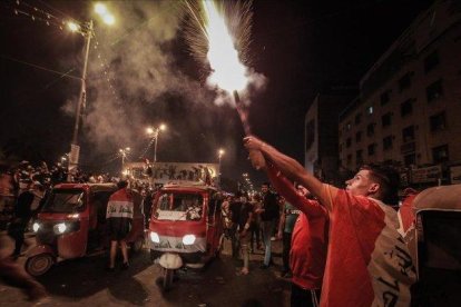 Manifestantes en la plaza Tahrir de Bagdad.-AMEER AL MOHAMMEDAW