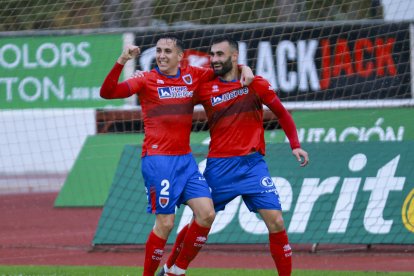 Lupu, en la imagen con Soler, es el pichichi del Numancia con diez goles tras el anotado en Getafe.