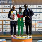 Pineda a la izquierda de la imagen como subcampeón del mundo en la prueba de los 60 metros lisos.