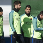 Neymar, Piqué, Suárez y Messi, en la ciudad deportiva antes de recibir al Atlético en la Copa.-JORDI COTRINA