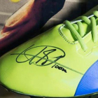 La zapatilla firmada de Usain Bolt.-EL PERIÓDICO