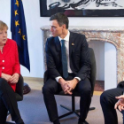Merkel, con Sánchez y Tsipras, representantes de los dos primeros estados con los que acordó el envío de migrantes.-EFE