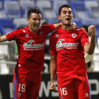 Natalio y Juanma celebran uno de los tres goles logrados por el equipo en Huelva.-ÁREA 11