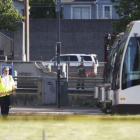 Policías que investigan el asesinato islamófobo de Portland.-JIAM RIYAN / AP