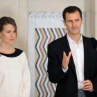 Asma y Bashar el Asad, en un acto en Damasco, en marzo.-ARCHIVO / AFP