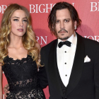 Johnny Depp y Amber Heard, el pasado enero en una gala en Palm Springs.-AP / JORDAN STRAUSS