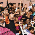 El líder del partido Bharatiya Janata Party (BJP), Narendra Modi, junto a sus seguidores.-AFP