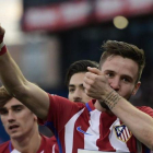 Saúl Ñíguez celebra el gol que dio la victoria al Atlético contra el Las Palmas, este sábado.-AFP / JAVIER SORIANO
