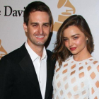 Evan Spiegel y Miranda Kerr, en una fiesta previa a la entrega de los premios Grammy del 2016.-MANDATORY BYLINE / JUAN RICO FAME