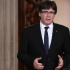 Puigdemont, durante su declaración institucional desde el Palau de la Generalitat.-JORDI BEDMAR