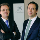 Jordi Gual, presidente de CaixaBank, y Gonzalo Gortázar, consejero delegado.-WWW JOANTOMAS NET