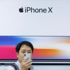 Presentación del un nuevo dispositivo de Apple ante los medios en Pekín, el pasado octubre.-REUTERS / THOMAS PETER