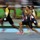 Bolt, durante la semifinal de 100 metros, esta madrugada.-GETTY / CAMERON SPENCER