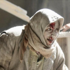 Una mujer herida por los ataques aéreos en Alepo.-REUTERS