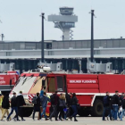 Simulacro de incendio en el aeropuerto de Berlín.-JOHN MACDOUGALL